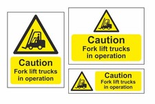 CAUTION FORKLIFT TRUCKS IN